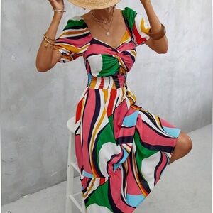 Large dress, colorful bold print.  Great for vacation!